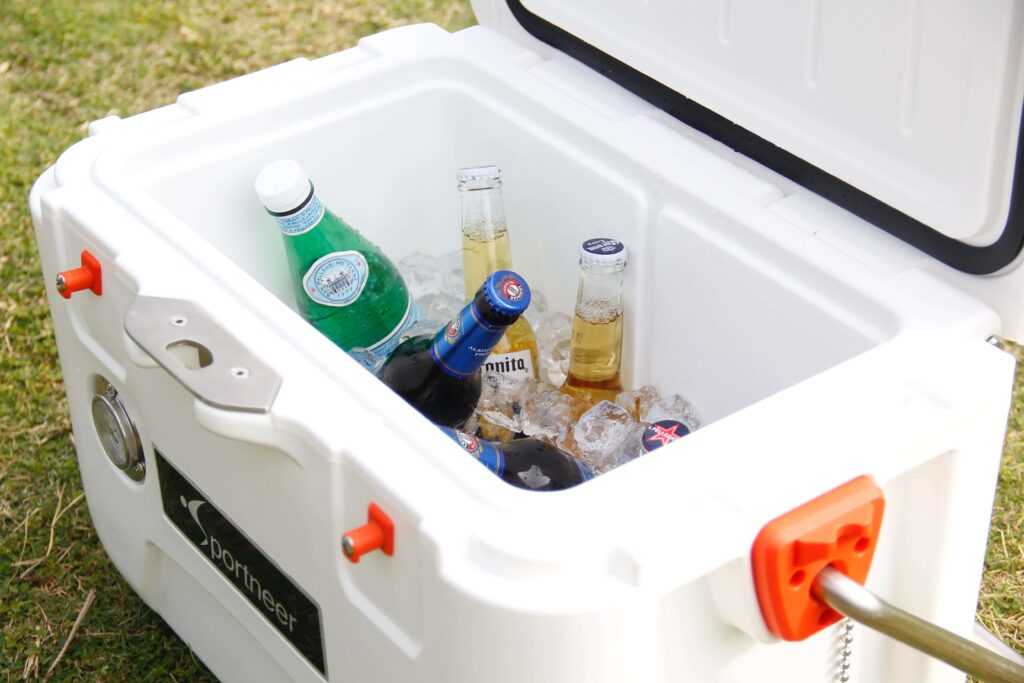 Cooler with ice and assorted drinks